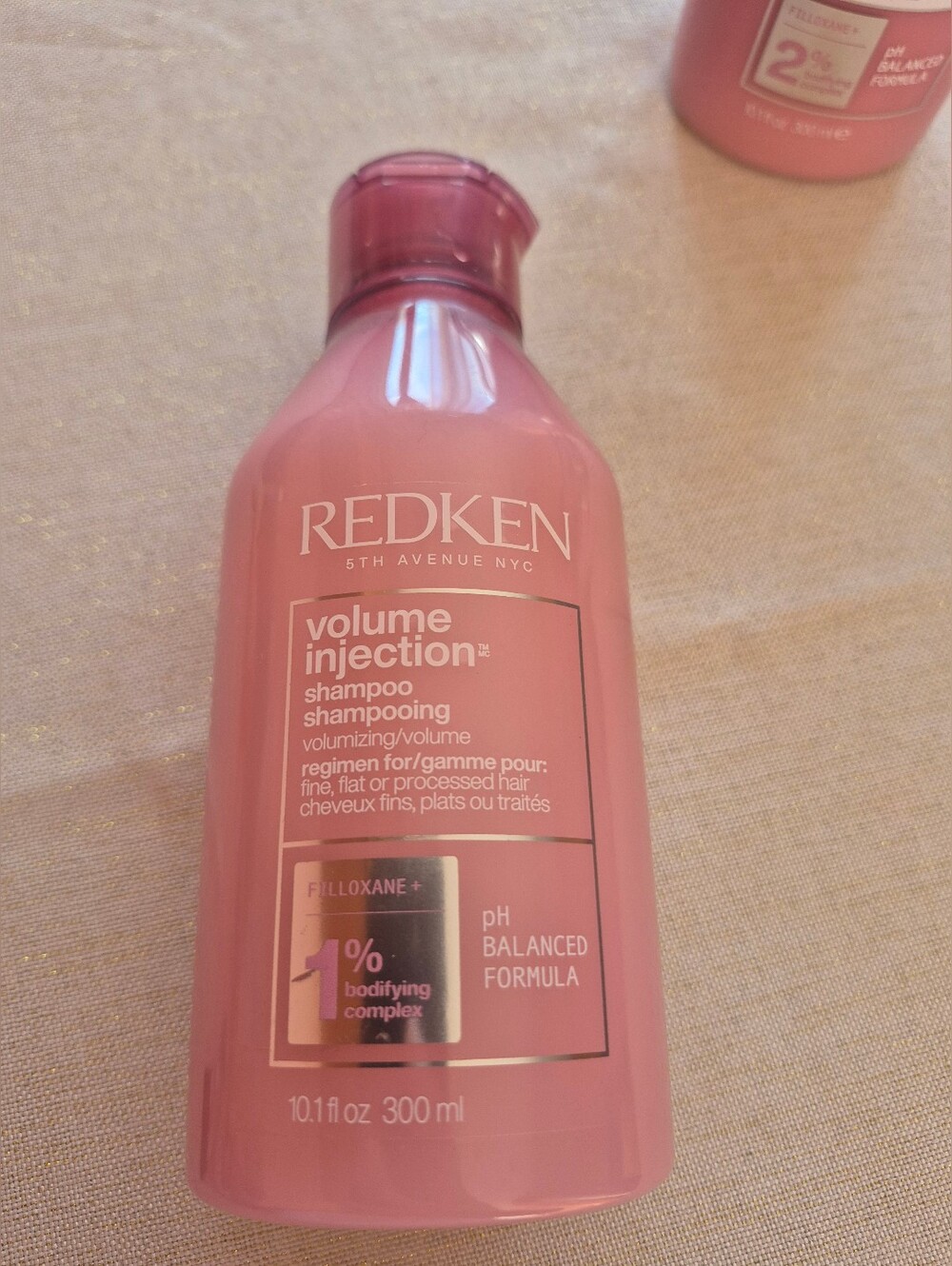 Redken Volume Injection Shampoo - Rose Pink Bottle